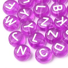 purple plastic letters and numbers on white background