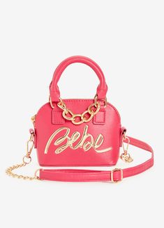 Opulent and refined, this Gianna crossbody bag by Bebe is for the fashionista that puts the extra in extraordinary. The oversize gold chain link and designer logo is right on time for the streetwear trend while the size is ideal for your essentials. Pink Crossbody Bag With Metal Logo, Trendy Shoulder Bag With Metal Logo For Everyday, Trendy Pink Shoulder Bag With Logo, Trendy Gold Shoulder Bag With Branded Hardware, Everyday Purse, Designer Logo, Ashley Stewart, Satchel Bag, Trendy Accessories