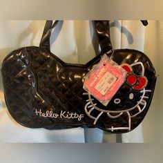 Hello Kitty Bow Bag.It Is 16x9. New With Tags. Cute Black Shoulder Bag For Party, Retro Black Bag With Zipper Closure, Black Cat Design Shoulder Bag For School, Trendy Hello Kitty Shoulder Bag, Trendy Black Bag With Hello Kitty Print, Black Rectangular Bag With Cat Design, Black Tote Bag With Cat Design, Cute Black Satchel Bag, Black Tote Shoulder Bag With Cat Design