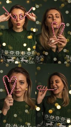 a woman holding two candy canes in front of her face