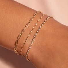 Our XYZ collection is filled with gorgeous, dainty, low-key pieces you'll hardly ever take off.Designed for the everyday, we focused on creating a range of staples made from materials of the very highest quality - namely 100% natural, sparkly top-drawer diamonds and solid gold that won't tarnish or flake, all at prices that seriously slay.Made by the very same craftsmen that produce those oh-so-traditional but overpriced jewelry brands, these modern gold classics allow you to indulge in what you Everyday 14k Gold Filled Bracelet, Adjustable Gold Chain Bracelet For Everyday Luxury, Dainty Rose Gold Bracelets For Everyday Luxury, Everyday Luxury Gold-plated Tarnish Resistant Bracelets, Dainty Rose Gold Everyday Luxury Bracelets, Everyday Luxury Tarnish Resistant Gold-tone Jewelry, Stackable Rose Gold Bracelets For Everyday Luxury, Gold Stackable Metal Charm Bracelet, Adjustable Gold Jewelry For Everyday Luxury