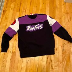 Brand New No Tags Mitchell And Ness Toronto Raptors Sweater. Size Xl Mens. Purple Tops With Ribbed Cuffs For Streetwear, Casual Purple Sweatshirt For Sports, Black Long Sleeve Throwback Tops, Toronto Raptors, Sweaters Crewneck, Mitchell & Ness, Purple Black, Purple And Black, Colorful Sweaters