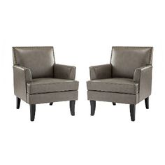 a pair of grey chairs sitting next to each other