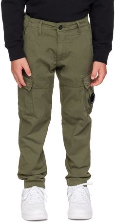 Garment-dyed stretch cotton gabardine cargo pants. · Belt loops · Three-pocket styling · Zip-fly · Logo lens at front · Cargo pocket at outseams Supplier color: Bronze green Model measures 48” / 121.9 cm tall and wears size 6Y. C.P. Company Kids Size: child's height 2Y: 36.25 / 92 cm 4Y: 41 / 104 cm 6Y: 45.75 / 116 cm 8Y: 50.5 / 128 cm 10Y: 56 / 142 cm 12Y: 61.5 / 156 cm 14Y: 67 / 170 cm Bronze Green, Fly Logo, C P Company, Color Bronze, Cargo Pocket, Kids Pants, Stretch Cotton, Cargo Pants, Apparel Accessories