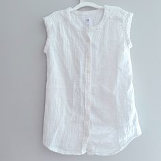 Gap Girls Size : M Supersoft Gauze-Y Texture With Double The Crinkle And Double The Fun. - Machine Wash. Cotton Color White Never Worn New Without Tags. Measurements Pit To Pit : 14” Length 24” Gap Cotton Tops For Summer, Gap Cotton Tank Top For Summer, Casual Sleeveless Tops By Gap, Sleeveless Gap Tops For Daywear, Casual Sleeveless Gap Tops, White Gap Tank Top For Spring, White Gap Tank Top For Summer, White Gap Tops For Summer, White Cotton Blouse By Gap