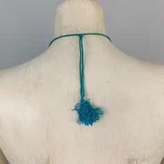 "Incredibly gorgeous 30s era turquoise inlay necklace and bracelet set featuring crushed turquoise with loops of brass and resin which are thread and knotted on silk with a wrapped corde upper. The necklace string expands and contracts with a sliding thread ball on the back of the necklace. The bracelet fastens with a toggle clasp. These turquoise inlay jewelry pieces were popular in the 1930s when they were imported from India. Just stunning! Bracelet measures 7 1/2\" long and 3/4\" wide. Neckl Traditional Jewelry With Sliding Knot For The Beach, Traditional Jewelry With Sliding Knot For Festival, Unique Adjustable Turquoise Choker, Artisan Adjustable Turquoise Necklace For Beach, Adjustable Bohemian Turquoise Choker Necklace, Green Adjustable-length Jewelry For Festival, Green Adjustable Jewelry For Festivals, Green Adjustable Jewelry For Festival, Vintage Adjustable Turquoise Beaded Necklace