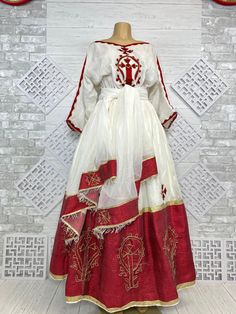 Beautiful Ethiopian and Eritrean Habeshan Dress. Stylish Menen, 100% Cotton We recommend hand washing and air drying to make it last longer. A low heating iron will also keep design and look. Beautiful Habeshan Dress |Ethiopian Traditional Dress|Eritrean Dress|Habesha Kemis|Zuria|Habesha Chiffon|Kemis Festive Tunic Dress With Traditional Patterns, Traditional Organza Dress With Pallu, Festive Tunic Dress For Traditional Ceremonies, Traditional Floor-length Dress For Celebration, White Dress For Eid Celebration, White Floor-length Dress For Celebration, Festive Dress With Traditional Patterns, Festive Dress With Traditional Patterns For Celebration, Traditional Festive Organza Dress