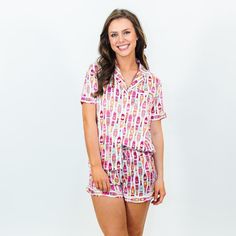 This Bubbly Silky Satin Pajama Short Set is the perfect combination of comfort and style. Made from high-quality fabric, it feels incredibly soft and smooth against the skin. The champagne bottle pattern adds a playful touch to the design, making it a fun choice for lounging , sleeping or special occaasions. The set includes a short-sleeved top and matching shorts, both featuring a relaxed fit for ultimate comfort. With its luxurious feel and trendy design, this pajama set is a must-have additio Nora Fleming Minis, Pajama Short Set, Pajama Short, Satin Pj Set, Maxi Jumpsuit, Satin Pajama, Baby Boy Shoes, Satin Pajamas, Pink Champagne