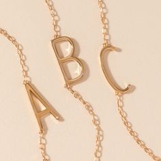 Layered looks are trending, and the luxurious Precious Elongated Initial Necklace is the perfect personal touch to your neck stack. This letter necklace is brilliantly crafted with a 14K gold-plated sterling silver chain and an elongated initial letter uniquely strung sideways. Whether you choose to wear your own initial or that of a cherished loved one, this necklace is a timeless piece that keeps your most treasured connections beautifully close to your heart. Neck Stack, Initial B, Initial Letter, Letter Necklace, Initial Letters, Layered Look, 14kt Gold, Sterling Silver Chain, Gold Plated Sterling Silver