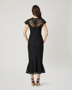 Gorgeous floral lace midi dress. This style features a round neckline with lace trim at the edge, sheer bodice yoke, short flutter sleeves, fitted bodice, and skirt with bottom ruffle flounce for a flattering silhouette. Bodice and skirt lined, upper yoke and sleeves unlined. Hidden back zipper. 100% Polyester. Dry clean only. Color: Jet Lace Midi, Lace Midi Dress, Top Sales, Fitted Bodice, Flutter Sleeve, Floral Lace, Round Neckline, Lace Trim, Day Dresses