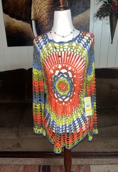 Vintage New W/ Tags "Multiples" (Missy Sienna) ~ Size Small Crochet Boho Hippie Sweater.  This is a beautiful sweater with multi-colors.  Details: 1.) Breast: 36-40" inches (loose fitting)  2.) Shoulder to shoulder: 16" in.  3.) Sleeve length: 28" inches  4.) Waist: 34-38" in.  5.) Hip: 42" inches  6.) Shoulder to hem: 25" in.  7.) 100% Acrylic  8.) Made in China  9.) Machine Wash  10.) Size Small  Thanks for looking & please look at my listings for more clothes Bohemian Crochet Long Sleeve Top One Size, Multicolor Knit Crochet Top With Crochet Trim, Multicolor Long Sleeve Open Knit Crochet Top, Multicolor Crochet Crew Neck Top, Bohemian Crochet Top With Crew Neck, Bohemian Crochet Crew Neck Top, Green Long Sleeve Crochet Top For Beach, Multicolor Bohemian Crochet Top For Fall, Bohemian Multicolor Crochet Top For Fall