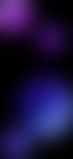 a blurry image of purple and blue colors