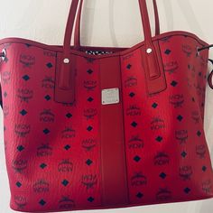 Mcm Oversized Bag. Purchased Brand New From The Real Real. Comes With Dust Bag And Clutch. Designer Red Shoulder Bag With Large Capacity, Designer Large Capacity Red Shoulder Bag, Luxury Red Shoulder Bag With Double Handle, Designer Red Shoulder Bag For Travel, Luxury Large Capacity Red Shoulder Bag, Luxury Red Double Handle Shoulder Bag, Designer Red Tote Bag, Designer Red Bags For Errands, Red Luxury Bags With Leather Handles