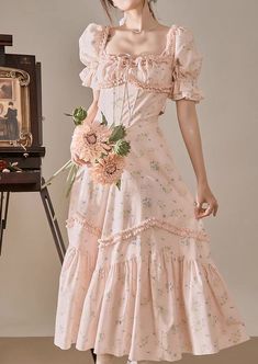 Feel like a princess in this sweet ditsy floral dress with a square neckline, short puff sleeves, ruffle details, basque waistline and mermaid flared midaxi skirt. Waist is enforced with fishbone boning and cinches with a self-tie waist strap. Concealed back zipper. S: 31.5" chest, 26" waist, 48" lengthM: 33" chest, 27.5" waist, 48" lengthL: 34.5" chest, 29" waist, 48" length Cute Square Neck Puff Sleeve Dress For Garden Party, Feminine Puff Sleeve Dress With Ruffles And Sweetheart Neckline, Feminine Puff Sleeve Dress With Sweetheart Neckline And Ruffles, Pink Midi Dress With Sweetheart Neckline And Ruffles, Puff Sleeve Midi Dress With Ruffles For Garden Party, Spring Puff Sleeve Dress With Ruffles And Sweetheart Neckline, Puff Sleeve Fitted Bodice Dress For Garden Party, Puff Sleeve Dress With Fitted Bodice For Garden Party, Fitted Bodice Dress With Ruffle Hem And Short Sleeves