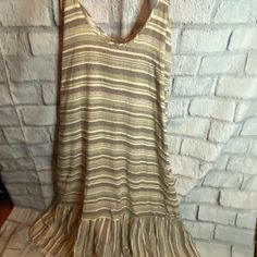 Size L Nwt Sleeveless Dress With Tie Straps Striped Dress With Ruffle At Bottom Scooped Neckline Material: 70% Viscose, 30% Linen Measurements: Length 57”, Armpit To Armpit 23” Sleeveless Ruffle Hem Beach Dress, Beach Sleeveless Dress With Ruffle Hem, Sleeveless Ruffle Hem Sundress For Vacation, Sleeveless Midi Dress With Ruffle Hem For Beach, Sleeveless Striped Vacation Dresses, Striped Sleeveless Vacation Dresses, Vacation Sleeveless Midi Dress With Ruffle Hem, Vacation Sleeveless Dress With Spaghetti Straps And Ruffle Hem, Summer Sleeveless Purple Mini Dress