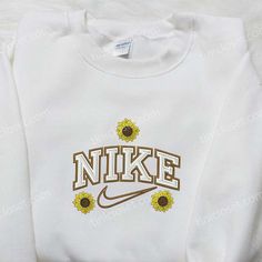 Product detail: Sporty Embroidered Long Sleeve T-shirt, Trendy Long Sleeve T-shirt With Embroidered Logo, White Embroidered T-shirt For Fall, Embroidered Cotton Crew Top, White Hoodie With Embroidered Graphics For Fall, Sporty White Tops With Custom Embroidery, White Cotton Sweatshirt With Custom Embroidery, White Embroidered Logo Top For College, White Embroidered Sporty Sweatshirt