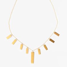 This Cala Charm Necklace will be a stunning addition to your statement jewelry collection. The geometric rectangle charms are designed to cascade down your neck for a beautiful complement to a “V” or sweetheart neckline. The smooth brushed matte 24k gold-plated finish adds an elegant touch, making it versatile enough to transition from casual to formal. Dimensions: 16in (406.4mm) chain with 2in (50.8mm) extension Lobster clasp Fringe Necklace, Gold Charm Necklace, Pop Up Shop, Egift Card, Statement Jewelry, Sweetheart Neckline, Kenya, Lobster Clasp, Charm Necklace