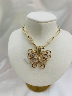 -14k tricolored butterfly pendant -butterfly pendant design composed of rose, and yellow gold  -cubic zirconia a stones  -100% real 14k gold  -large bale to fit up to a 5MM chain  -great exotic, statement piece of jewelry  -will not tarnish nor change color  -great for everyday use  -item sold by piece. Weight is undetermined. Pendant Butterfly, Turtle Ring, Pendant Design, Butterfly Pendant, Pendant Necklaces, Statement Pieces, Color Change, Jewelry Necklace Pendant, Cubic Zirconia