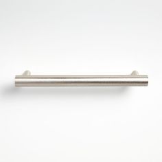 a stainless steel door handle on a white background