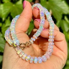 This Opal necklace pairs some highly translucent Ethiopian Opals with a neon rainbow cord that emphasizes the glow and subtle fire of the stones. Necklace is 17.5" long with opals graduated in size from 5mm to 7mm. Finished with 14/2o gold-filled findings. You'll receive the exact necklace shown in the listing photos and video. Please remember that Ethiopian Opals (and the silk cord they're knotted on!) require more care than other gemstones or jewelry styles. Ethiopian Opals are often hydrophan Gem Candy, Ethiopian Opal Necklace, Stones Necklace, Jewelry Styles, Jewelry Knots, Rainbow Necklace, Neon Rainbow, Jewelry Accessories Ideas, Dream Gift