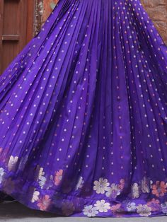 This stunning gown comes in a beautiful violet color with intricate zari weaving work, adding a touch of elegance and grace to your look.
Crafted from high-quality Banarasi silk, this fully stitched gown is available in sizes XS to XL, ensuring a perfect fit for every body type. The gown has a 4-meter flair and a length of 54 inches, offering a flowing and flattering silhouette.
Pair this violet gown with matching accessories and heels to complete your look and turn heads wherever you go.
This g Violet Gown, Engagement Gown, Lehenga Crop Top, Lehenga Choli Wedding, Floral Lehenga, Party Wear Lehenga Choli, Reception Gown, Bollywood Lehenga, Cocktail Wear