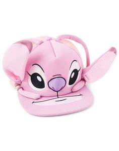 a pink hat with an animal face on it