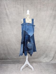 a dress made out of jeans on a mannequin