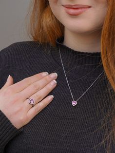 💕 Share your belief in love with the world through the Sparkling Pink Elevated Heart Ring. Featuring a heart-shaped pink artificial crystal nestled within its mount, surrounded by a dazzling pavé setting on the front of the band, this ring exudes elegance and charm. Elevate your style by pairing it with Pandora Timeless' pink Heart pendant and other timeless jewelry pieces. Let its beauty captivate all who behold it. 💖✨ Crafted with care, the 'Pandora Necklace' is the perfect choice for any occasion, be it birthdays, anniversaries, or simply to show appreciation to the remarkable woman in your life. Whether she's a nurturing mother, a loyal sister, a cherished friend, or a beloved partner, this necklace offers a personalized and heartfelt token of gratitude. Its design, inspired by the e