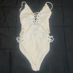 Women’s Fashion Nova Swimsuit Size Small. Color Is Off White With Rose Gold Detail. No Padding In The Breast Area. New! Never Worn. Fitted White Swimwear For Day Out, Trendy White Bodysuit For Beach Season, Trendy White Bodysuit For Vacation, White Summer Bodysuit For A Day Out, White Bodysuit For Summer Day Out, White Summer Bodysuit For Party, Fashion Nova Swimsuit, Swim Fashion, Gold Details