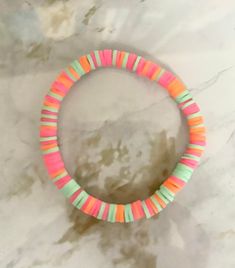 This bracelet is perfect for any colorful outfit. It is super cute! In the bracelet the colors inclue pink, orange, and light blue!🧡💙 Orange And Light Blue, Colorful Outfit, Pink Bracelet, May 7, Colourful Outfits, Pink Orange, Jewelry Bracelets, Light Blue, Super Cute