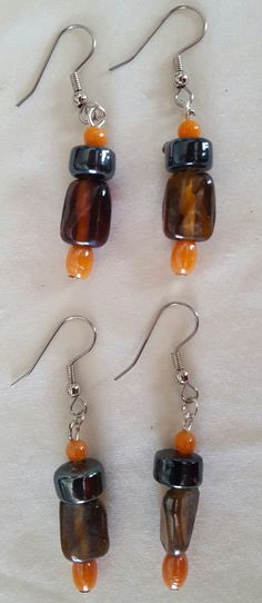 These earrings created with earth tone beads are fun and look great for any occasion. Tiger Eye Earrings, Unique Gifts For Mom, Unusual Earrings, Handmade Earrings Beaded, Jasper Earrings, Artisan Earrings, Birthday Gifts For Girlfriend, Eye Earrings, Bohemian Jewelry