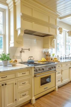 a kitchen with an oven, sink and dishwasher is shown in this image