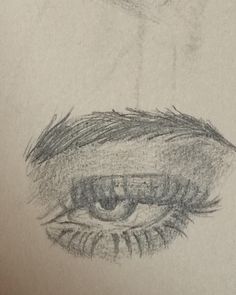 a pencil drawing of a woman's eye