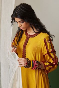 Yellow chanderi silk kurta with hand embroidery at sleeves and kurta front.
Components:1
Pattern:Embroidery
Type of Work:Hand embroidery
Neckline:Round
Sleeve Type:Three quarter
Fabric:Chanderi Blend
Color:Yellow
Other Details:
Side tassels
Note: The dupatta and pant worn by model is not for sale.
Occasion:Mehendi and Haldi - Aza Fashions Semi-stitched Chanderi Kurta With Resham Embroidery, Semi-stitched Resham Embroidery Chanderi Kurta, Cotton Silk Straight Kurta With Embroidered Border, Designer Straight Kurta With Dabka Work, Straight Chanderi Kurta With Embroidered Border, Chanderi Kurta With Resham Embroidery For Navratri, Designer Chanderi Kurta With Dabka Work, Chanderi Straight Kurta With Embroidered Border, Unstitched Resham Embroidered Kurta For Navratri