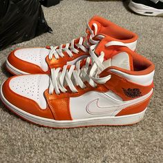 It’s Used Air Jordan 1 Mid Size 9.5 Orange White Still Look Nearly New Don’t Have Box Shoes Is Over 2 Years Old Wore Them A Least 5 Times And The Real Deal Air Jordan 1 Mid Se, Box Shoes, Air Jordan 1 Mid, Mid Size, Jordan 1 Mid, Jordans For Men, Air Jordan 1, Orange White, Jordan Shoes