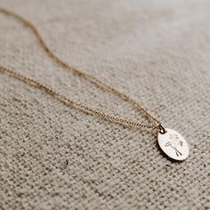 Wildflower Oval Necklace - Hope on a Rope Jewelry Dainty Oval Engraved Charm Necklaces, Dainty Engraved Oval Charm Necklaces, Dainty Oval Necklace With Flower Charm, Dainty Engraved Oval Charm Necklace, Dainty Oval Charm Necklace For Everyday, Wildflower Design, Rustic Necklace, Detailed Necklace, Oval Necklace