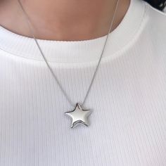 The Star Necklace Silver Women Jewelry features a stainless steel bubble star design, making it a perfect puffy chunky statement jewelry gift for her. The perfect dainty necklace to get a friend, girlfriend, coworker, or daughter! 𝐃𝐄𝐓𝐀𝐈𝐋𝐒:  ⭐️ Star Necklace length 16" + 2" extender  ⭐️ Chunky Star Pendant size is 24mm x 24mm ⭐️ This Puffy Star necklace is 100% stainless steel, water & tarnish proof made to last forever ✨ ⭐️ The best statement chunky necklace to own, The Stargirl necklace Stargirl Necklace, Silver Star Necklace, Star Necklace Silver, Friend Girlfriend, Star Jewelry, Star Design, Chunky Necklace, Friend Birthday Gifts, Gift For Friend