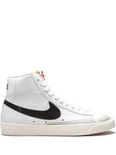 White leather/rubber Blazer Mid 77 Vintage sneakers from NIKE featuring signature Swoosh logo detail, contrasting panel detail, round toe, front lace-up fastening, logo patch to the front, ankle-length, branded insole and rubber sole. These styles are supplied by a premium sneaker marketplace. Stocking only the most sought-after footwear, they source and curate some of the most hard to find sneakers from around the world.. | Nike Blazer Mid 77 Vintage sneakers Mid Blazer 77, Blazers Nike, Nike Blazer 77, Nike Tenis, Blazer 77, Blazer Mid 77 Vintage, Nike Blazer Mid 77, Outfits Hombre, Nike Blazer Mid