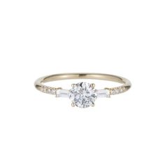 This beauty is pared down in simplicity, but with such a clear and melodic voice.  She is perfection for the alternative bride.  A classic piece. Alternative Bride, Gold Text, Baguette Diamond, Diamond Rings, Locket, Baguette, Diamond Jewelry, Ring Size, Fine Jewelry