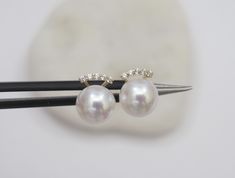 Material : Genuine Natural Freshwater Pearls with 18K Gold / White Gold Posts with Cubic Zirconia Quantity : One Pair Earrings Color : Natural White Pearls with 18K Gold/White Gold Posts Pearl Shape : Round Pearl with High Luster Pearl Size : 7mm approx. Lead Time & Shipping : We will ship your order in 1-2 business days to you once we received it. If we offer FREE DOMESTIC shipping, package will be shipped via USPS First Class mail on orders shipping within the U.S.. **Express Mail orders r White Pearl Earrings With Diamond Accents For Wedding, Akoya Pearl Round Earrings For Wedding, White Akoya Pearl Earrings For Wedding, White Akoya Pearl Wedding Earrings, Yellow Gold Akoya Pearl Earrings For Wedding, Pearl Earrings With Diamond Accents For Wedding, Fine Jewelry Round Pearl Earrings For Wedding, White Pearl Earrings With Diamond Accents For Anniversary, Round Pearl Earrings With Diamond Accents For Wedding