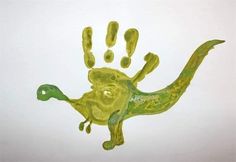 an animal handprint is shown in yellow and green