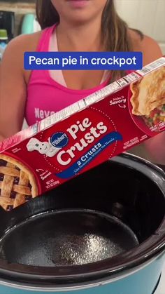 a woman holding a box of pie crusts in front of an open crockpot