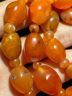 The beautiful orange color carnelian beads necklace from Himalaya Nepal This beads were used in prayer malas and used as jewelry and amulets in ancient times very smooth and shinny surface of this beads because of passage of time and usage of this beads in prayers mala and in necklace The age of this beads are more than 1000 years small size agate beads are used as spacers in the necklace we provide fast and free shipping service to our customers by which can get the items by maximum 7 working d Spiritual Amber Beads For Jewelry Making, Spiritual Carnelian Amber Beads, Vintage Amber Carnelian Beads Gems And Cabochons, Antique Amber Gemstone Beads, Innovative Packaging, Carnelian Necklace, 1000 Years, Carnelian Beads, Amulets