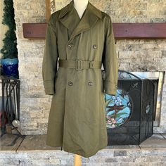 Winter Coat Unisex Shown On Women 5’7 Med /Large- Would Work For Women Medium ( Oversized). Large Or X Large Mens Medium Vintage Wwil Us Army Trench Coat Belted Double Breasted Cotton Step Back In Time With This Authentic Wwll Era Us Army Trench Coat. This Historical Piece Features A Classic Double-Breasted Design, Epaulettes, And A Belt, Embodying The Iconic Military Style Of The 1940s. The Coat Comes With A Removable Wool Lining. Condition: Excellent Gently Worn Size: Medium Features: Belted, Double-Breasted, Epaulettes, Long, Removable Wool Lining, Heavy-Duty Construction Brand: Us Army Type: Coat Style: Trench Coat Color: Army Green Material: 100% Cotton- Removable Wool Lining . Tags Classic Fitted Olive Outerwear, Retro Double-breasted Workwear Outerwear, Retro Khaki Outerwear With Button Closure, Vintage Double-breasted Solid Outerwear, Vintage Double-breasted Outerwear With Pockets, Vintage Double-breasted Pea Coat With Pockets, Vintage Fitted Khaki Outerwear, Fitted Vintage Khaki Outerwear, Fitted Khaki Vintage Outerwear