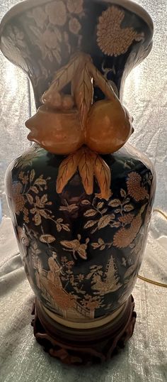 a decorative vase sitting on top of a table