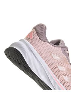 Made for your daily run, this breathable mesh running shoe is constructed with a padded collar, full-length EVA midsole and grippy rubber sole. Energy return: transforms every heel strike into responsive, explosive forward movement Lace-up style Textile and synthetic upper/textile lining/rubber sole Imported Pink Running Shoes With Boost Midsole For Training, Pink Synthetic Running Shoes For Light Sports, Adidas Synthetic Running Shoes For Workout, Pink Running Shoes For Light Sports, Adidas Workout Running Shoes With Synthetic Material, Pink Training Running Shoes With Boost Midsole, Pink Athletic Fit Running Shoes With Boost Midsole, Pink Athletic Running Shoes For Light Sports, Pink Athleisure Running Shoes For Light Sports