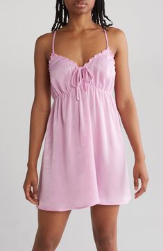 A lightweight washed satin chemise with dainty lettuce edge trim brings feminine style to your evening. V-neck Adjustable straps Front keyhole with ties Empire waist Washed satin construction 100% polyester Machine wash cold gentle, tumble dry low Imported Model’s stats for sizing: 5’11” height, 32” bust, 25” waist, 35” hips. Model is wearing size S. Spring Satin Slip Dress For Loungewear, Satin Slip Dress For Spring Loungewear, Feminine Satin Sleepwear For Summer, V-neck Sleepwear With Adjustable Straps, Summer V-neck Sleepwear With Ruffles, Summer V-neck Ruffled Sleepwear, Spring Sleepwear With Adjustable Spaghetti Straps, Spring Sleepwear With Adjustable Straps, Summer Satin Finish Camisole Dress