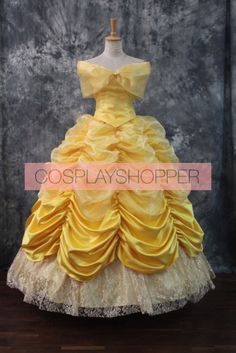 a yellow and white dress with ruffled layers