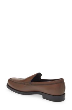 A classic keeper strap and exposed hand-stitching add a refined touch to a sharp Italian loafer crafted in semiglossy calfskin leather with a pebbled sole. Leather upper and lining/rubber sole Made in Italy Designer Shoes Timeless Tassel Loafers With Leather Lining For Semi-formal Occasions, Timeless Semi-formal Tassel Loafers With Leather Lining, Timeless Leather Sole Moccasins For Business, Timeless Goodyear Welted Moccasins For Office, Timeless Business Moccasins With Leather Sole, Business Moccasins With Leather Sole And Moc Toe, Timeless Leather Monk Strap Shoes For Business Casual, Plain Toe Loafers With Stitched Sole For Semi-formal Events, Plain Toe Loafers With Stitched Sole For Semi-formal Occasions