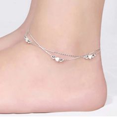 Silver 2 Tier Layered Ankle Bracelet Snake Chain With Hearts & Round Beads. See Photos For Details. Colors May Vary Due To Screen Differences & Lighting. Check Out My Closet! More Like This & Hundreds Of New & Preloved Items! Bundle & Save With Combined Shipping! All Items Must Be Bundled Together. Once You Agree To An Offer You Cannot Add More Items. Please Bundle & Send Me A Reasonable Offer, I Will Either Accept Or Counter. Womens Women Ladies Ladys Girls Feminine Dainty Elegant Glamorous Sop Shabby Chic Beach, Juicy Couture Bracelet, Latest Bracelets, Crystal Anklet, Evening Dinner, Beaded Beads, Boho Crystal, Butterfly Bracelet, Silver Anklets